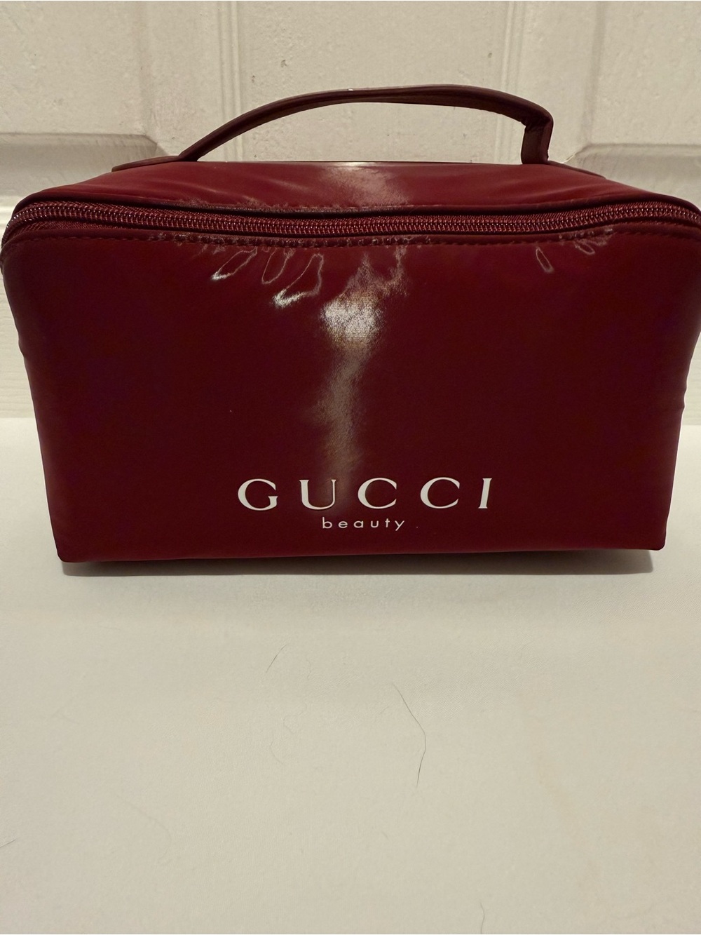 GUCCI, BEAUTY COSMETIC VANITY BAG IN BURGUNDY